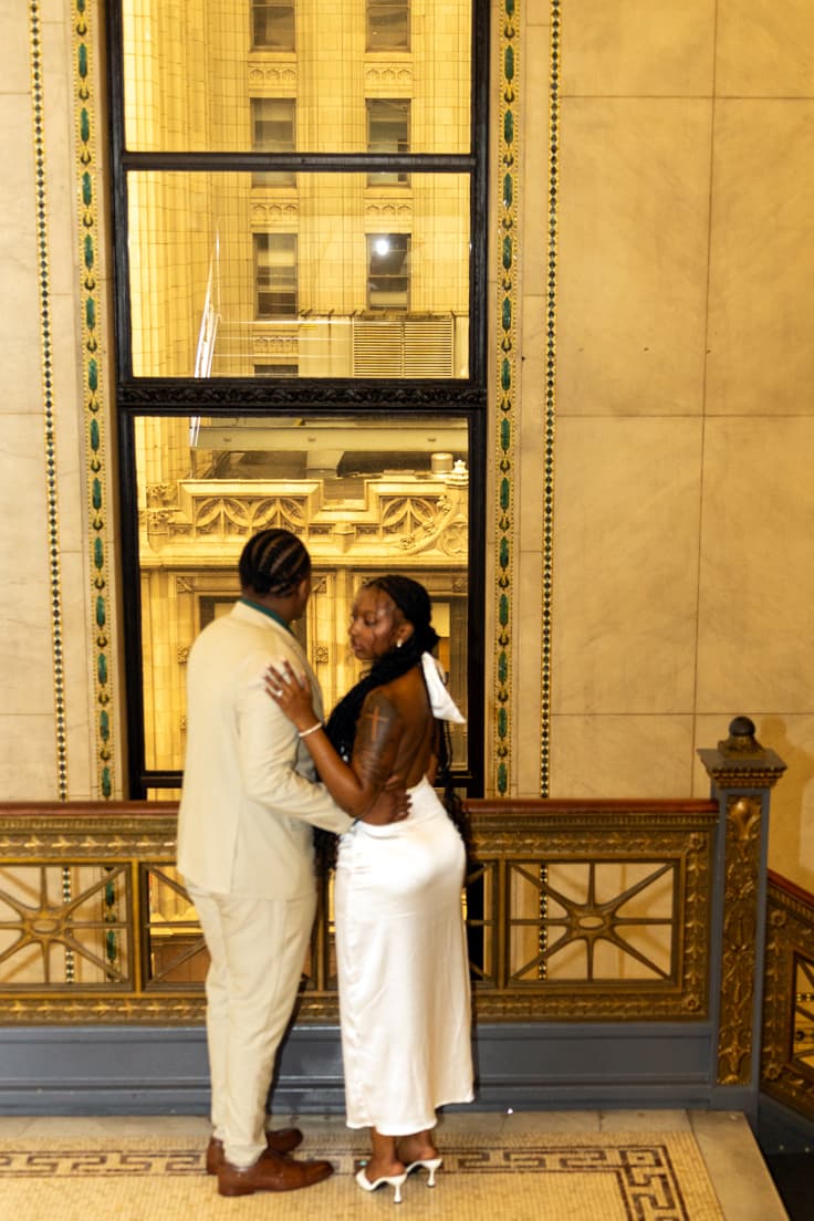 Anthony and Karmyn by the window